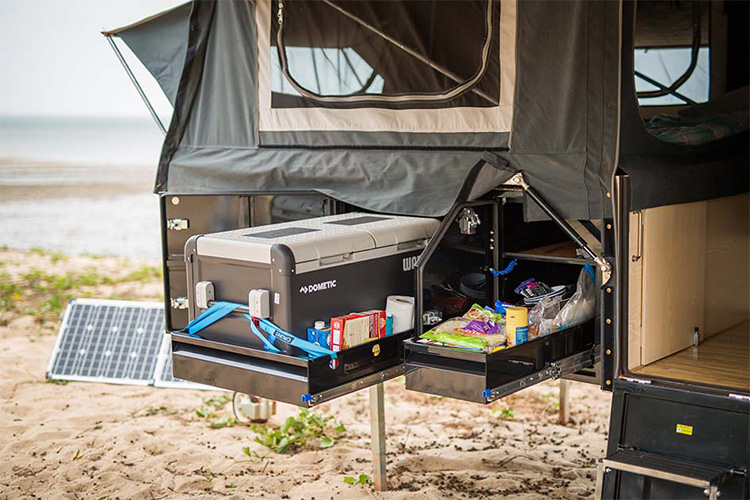 Camper trailer pull out storage