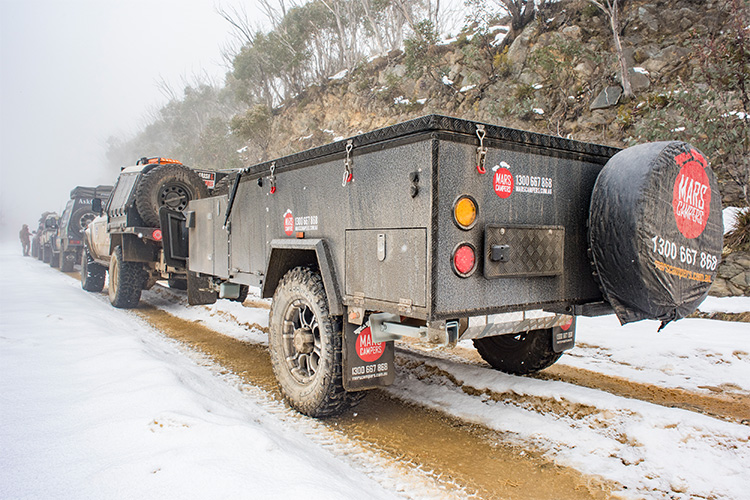 Camper trailer convey through the snow