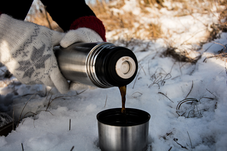 hot coffee in snow