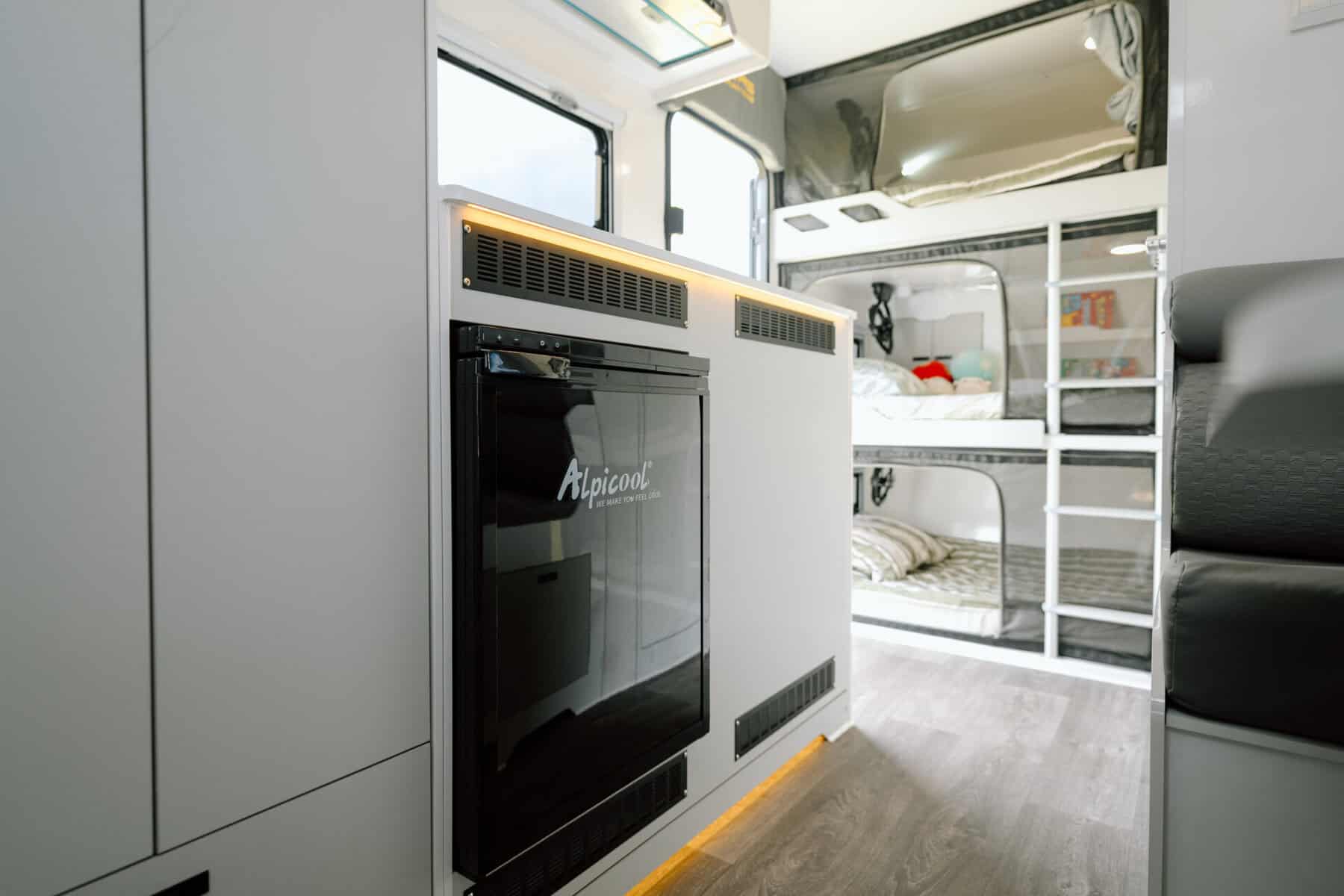 Mars 15 elite triple bunk hard roof offroad family caravan interior fridge and kitchen